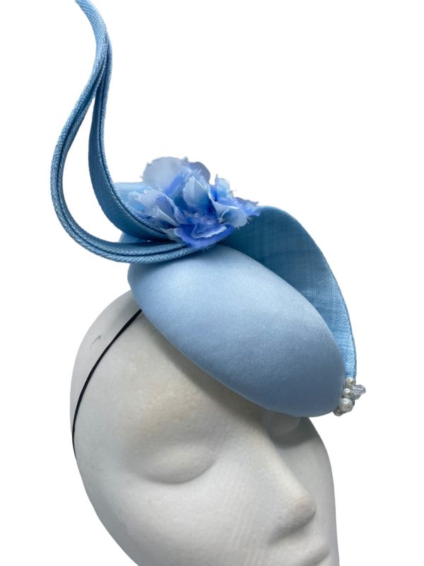 Ice blue structured headpiece.